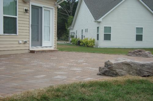 EP Henry Villages Square Paver Patio with Boulders (After)
